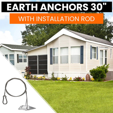 Image of Deep Penetration 31 Inch Ground Anchor Kit Set Of Four With Driving Rod for Storage Sheds and Swing Sets next to a mobile home.