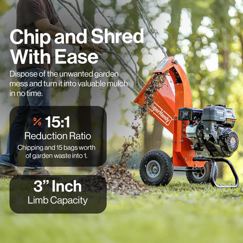 Orange Compact 7HP Mini Wood Chipper Shredder Mulcher For Quick Yard Cleanup Handles Branches Up To 3 Inches next to person.