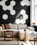 Kick The Echo To The Curb With Hexagon Acoustic Panels 12 Pack Self Adhesive Sound Proofing Foam Wall Tiles High Quality Polyester Fiber Noise Reduction Tiles For Room Treatment on black wall behind modern sofa.