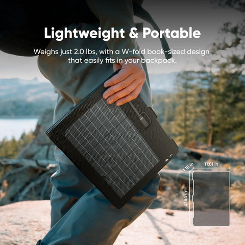 Person holding 40W Air Foldable Solar Panel Kit With Book Sized PERC Bifacial Cells in nature, showcasing portable lightweight design.
