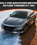 Silver sedan driving on icy terrain with text 'Built for Whatever Mother Nature Throws at You' above the car.