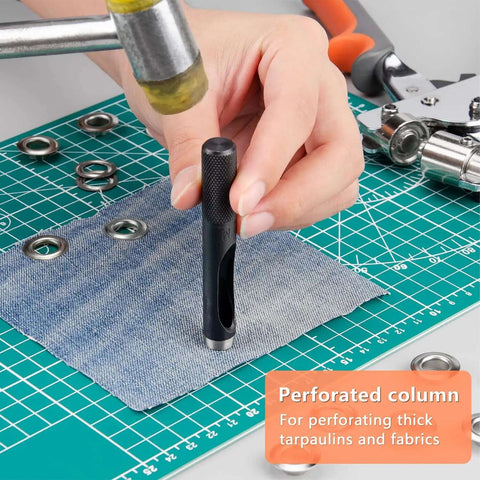 Using Heavy Duty Grommet Tool Kit With Eyelet Plier Handheld Puncher Set on fabric with silver grommets on cutting mat