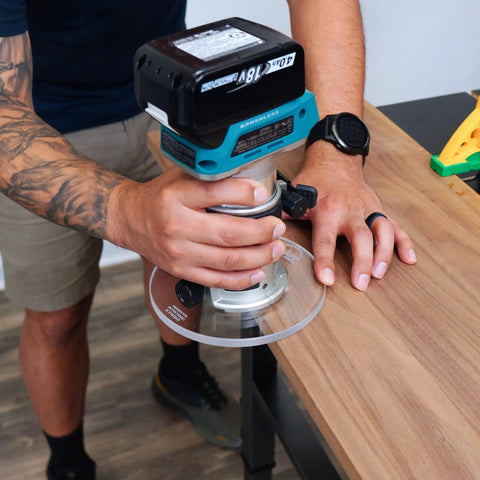 Top Shelf 6 Inch Round Router Base Plate For Makita Rt0701c And Xtr01z Compacts in use on a wooden surface.