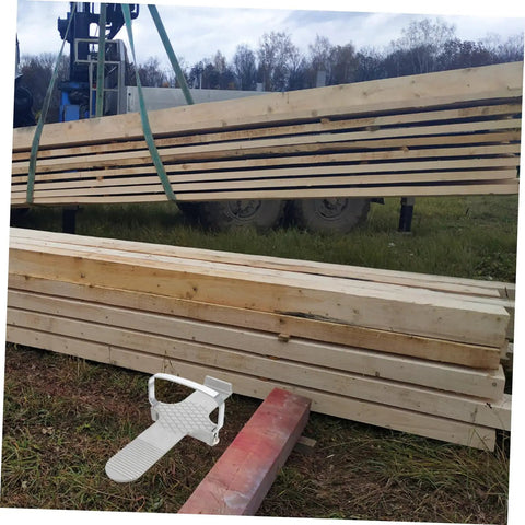 Heavy Duty Furniture Lifter That Makes Moving Day A Complete Piece Of Cake Without Making You Break A Sweat For Easily Hoisting Doors Windows And Drywall Panels With Non Slip Traction beside stacked wooden beams.