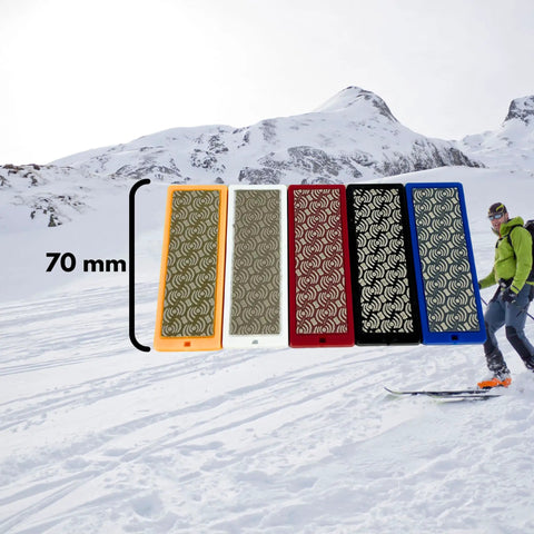 Moonflex Diamond Stones 70 mm Full Set Of Five For Ski And Snowboard Edge Tuning Pro Grade Includes 100 Black 200 Red 400 Yellow 600 White And 1500 Blue Grits For Coarse Shaping To Mirror Polish shown with skier and snowy mountains in background
