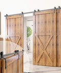 Black Rustic Single Track Bypass Sliding Barn Door Hardware Kit For Three Doors, installed with straight and bent rollers