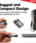 Compact 10 Function Bike Tool Kit, Heavy Duty Bicycle Multi Tool, shown with hand for size comparison, lightweight and pocket-sized.