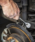 Using Two Piece One Quarter Inch And Three Eighth Inch Drive 84 Tooth Teardrop Ratchet Set Built Tough For Tight Spaces on vehicle brakes