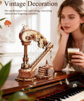 3D Wooden Harp Music Box Kit For Adults displayed on a piano, highlighting intricate wooden design and self-playing mechanism