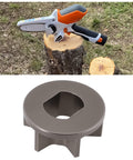 Image of a 6-teeth GTA 26 Sprocket for one quarter inch chain wheel alongside Stihl GTA 26 wood cutter tool on tree stump