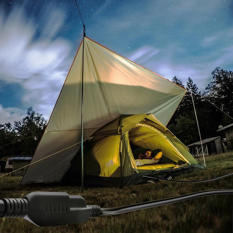 Two Pack 3 Foot Outdoor Extension Cords 16 AWG SJTW Weatherproof 13 Amp 1625 Watt ETL Listed Beefy Heavy Duty Flexible 3 Prong Power Cables NEMA 5P To NEMA 5R For Lawn Yard And Office shown powering a tent in a campsite.