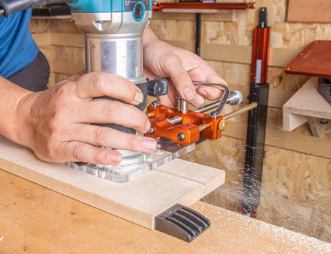 Rock Solid Router Guide Rail Adapter With Swivel Quick Adjust For Curved Arc Projects Universal Fit showing hands using it on wood.