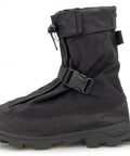 Rock Solid Ice Grip Winter Hiking Boots With 32 Replaceable Aluminum Studs And Sturdy Heel Spikes For Nasty Trail Traction Cold Weather Workhorse Footwear side view of black waterproof boots with adjustable strap.