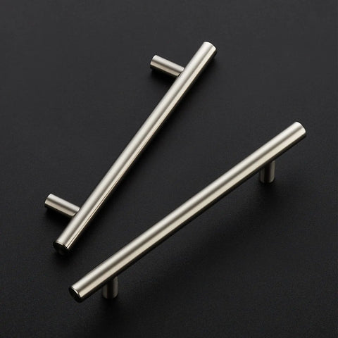Two 7.38 inch brushed nickel cabinet pulls stainless steel kitchen cupboard handles with 5 inch center to center holes on black background.