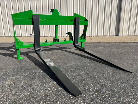 No Hassle Dual Mount Tractor Pallet Forks For Front Loader And Three Point Hitch showing heavy-duty black forks and bright green frame.