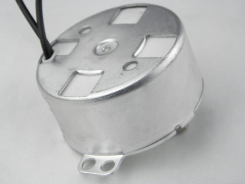 Close-up of 12V AC Synchronous Motor TYD-50 with 10-12 RPM, CW fixed rotation, showing top casing and wires.