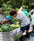 Children watering plants in Raised Garden Bed Kit With Galvanized Planter Boxes 2 Pack 4x2x1ft Easy Assembly Outdoor Garden Bed
