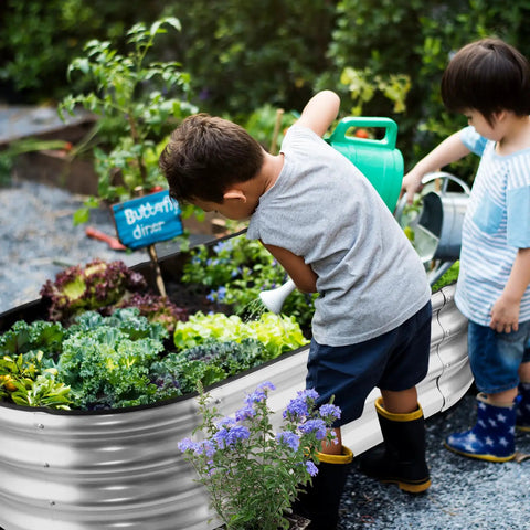 Children watering plants in Raised Garden Bed Kit With Galvanized Planter Boxes 2 Pack 4x2x1ft Easy Assembly Outdoor Garden Bed
