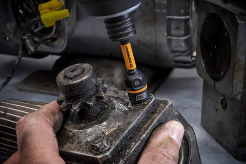 16 Piece Bolt Biter Nut Extractor And Driver Set With Beefy Bi Directional Removal being used on a damaged fastener