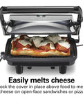 Hamilton Beach Panini Press And Sandwich Maker With Electric Indoor Grill Nonstick Plates For Perfect Grilled Cheese Quesadillas And Gourmet Pizzas Quick Easy Cooking For Busy Weeknights And Party Snacks with melted cheese sandwich inside.