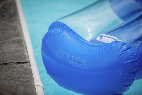 Inflatable blue pool float in water, showcasing the versatility of Crystal Clear Duct Tape 1.88 Inch by 9 Yard Heavy Duty All Purpose Tape.
