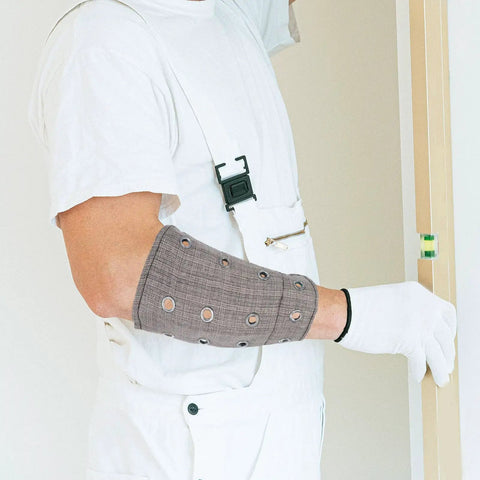 Heavy Duty Cut Resistant Wrist Sleeves Built Tough With Reinforced Denim For Industrial Steel Handling Abrasion Proof Forearm Guards That Kick Ass At Work Sites (1 Pair) worn by a worker measuring.