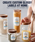 Glass jars with custom glossy labels for flour, pasta, oats, and sugar showcasing organization in the kitchen.