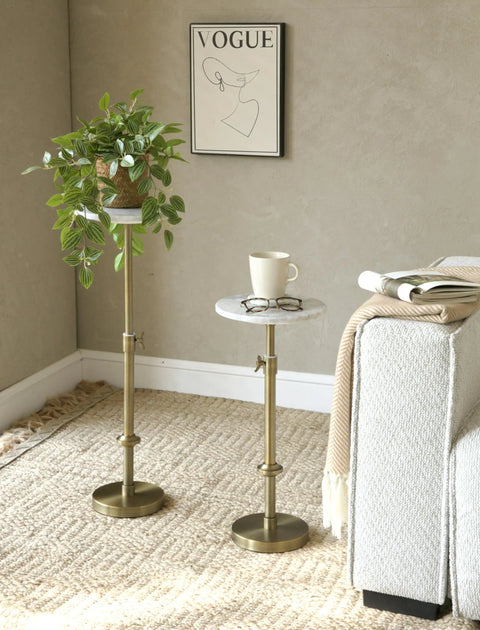 Adjustable Height Marble Drink Table With White Marble Top And Antique Brass Pedestal, Sleek Round End Table shown by sofa