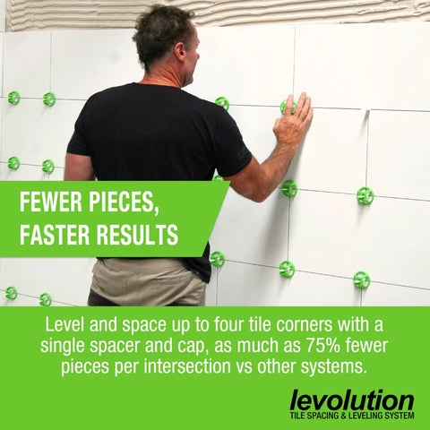 Man using Evolver Tensioning Tool For Tile Leveling And Spacing System Lippage Control on wall tiles, showcasing fewer pieces needed.