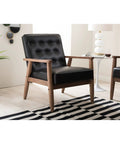 Mid Century Lounge Chair With Wood Frame In Dark Walnut Finish, Button Tufted Cushions With Piping, Removable Cushions in a living room.