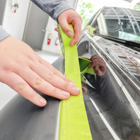 Applying Pro Grade Three Quarters Inch Auto Paint Masking Tape, 55 Meter Green, UV and Solvent Resistant for pro refinishing