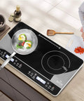 Duxtop Portable Double Induction Cooktop With 1800W Digital Electric Burner Sensor Touch Control And Lcd Display For Countertop Use with frying pan and ingredients.