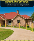 Four Pack Of 48 Inch Removable Steel Safety Bollards Built Like A Tank For Forklift Protection And Parking Barrier Security With Bright Yellow High Vis Stripes And No Sweat Setup in a residential pathway setting.