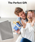 Ultra Soft Microfiber Cleaning Cloths 3 Pack next to a happy couple with a gift in a modern home setting.