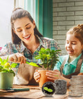 Mother and child transplanting plants with 50 Count 30Mm Peat Pellets Seed Starter Pods No Fuss For Seedlings Seedling Pots