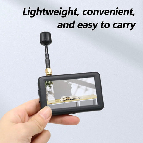 Hand holding 3 Inch Micro FPV Monitor With 480x320 LCD Display 5 8Ghz 40 Channel Auto Search Built In Battery RaceBand Ready For RC Multicopters Drones Boats Trucks Crawler Quadcopter