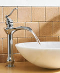 Chrome Vessel Sink Faucet With Waterfall Spout Pop Up Drain Supply Hose And Single Handle Lavatory Mixer Tap For Tall Body Bathroom Setup Slick Solid Brass Build With Ceramic Cartridge For Leak Free Performance in a modern bathroom setup