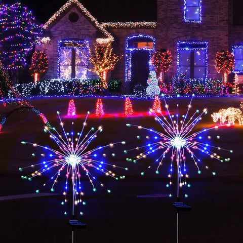 Must Have Outdoor Solar Firework Stake Lights With 120 LEDs Waterproof 2 Pack Sparklers in a festive garden setting