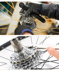 3 In 1 Sprocket Remover And Chain Whip Tool, 8 Inch Length, used for bike cassette removal and maintenance on wheel.