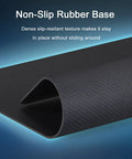 Close-up of Black Square Mouse Pad with Non Slip Rubber Base Smooth Polyester Surface for Office Work Gaming Minimalist Desk Accessory