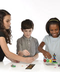 Children performing experiments from Magnetic Science Kit For Kids Ages 8 Plus With 33 STEM Experiments, learning about magnets.
