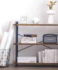 Heavy Duty Top Tier Industrial Bookshelf Featuring Solid Wood Planks And Sleek Matte Black Steel Frame For Living Room Decor Zero Hassle Quick Snap Assembly with books and decor.