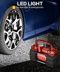 Heavy Duty 12V Portable Tire Inflator And Air Compressor Pump Hella Quick 150 Psi Max Pressure With Bright Led Work Light No Mess Setup for dark surface near a vehicle tire.