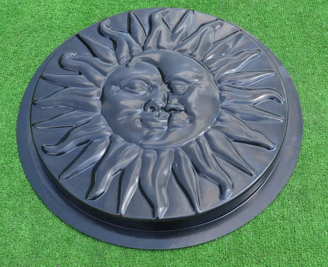 Sun And Moon Concrete Stepping Stone Mold For Plaster Garden Path Decor Fifteen Point Seven Inches Diameter One And A Half Inch Thick ABS Plastic Stone Mold S11 on grass, showing sun and moon design.