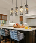 Four Light Black Crystal Pendant Lights with Adjustable Dope Modern Mini Island Chandeliers in kitchen setting over island