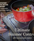 Two-Burner Propane Camp Stove With InstaStart Ignition And Wind Guards in use with pot on burner
