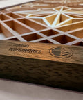 Close-up of Kumiko DIY Kit With Kakuasa No Ha Pattern Ready To Assemble Wall Art in cherry wood and black walnut frame, 154 pieces.