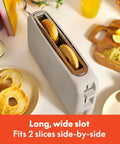 Slick Two Slice Slim Toaster With Hella Long Slots For Versatile Even Heating And A Tight Oat Milk Finish That Ditches Everyday Countertop Clutter While Kicking Out Perfect Crisps Daily with toasted bagels.