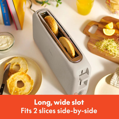 Slick Two Slice Slim Toaster With Hella Long Slots For Versatile Even Heating And A Tight Oat Milk Finish That Ditches Everyday Countertop Clutter While Kicking Out Perfect Crisps Daily with toasted bagels.