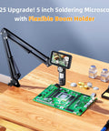 Handheld Digital Microscope With Flexible Boom Arm For Soldering And Electronics on a wooden desk with electronic components